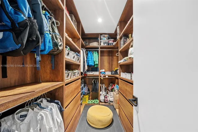 a swimming pool with outdoor seating and garden