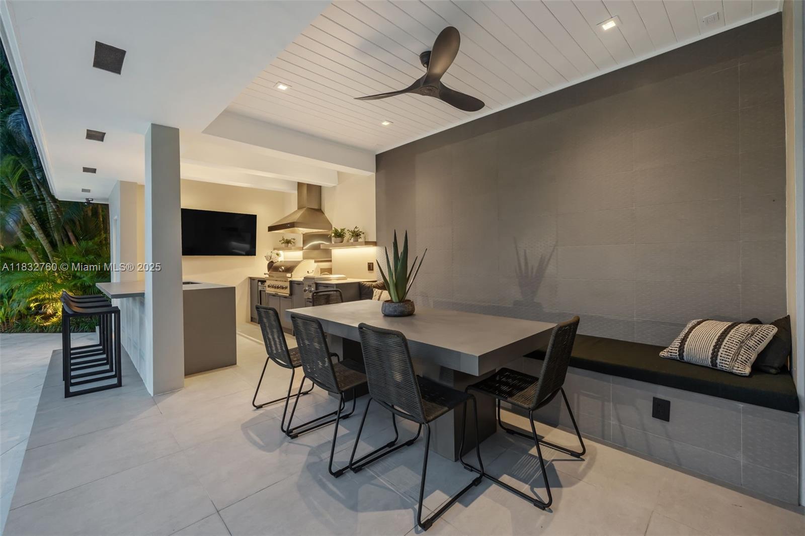 4800 Bay Point Road Miami, FL 33137 - Photo 61 of 74 a view of a dining room with furniture