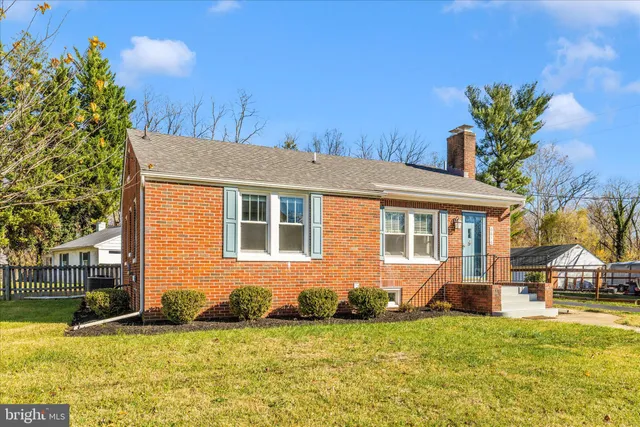 a view of a house with a swimming pool