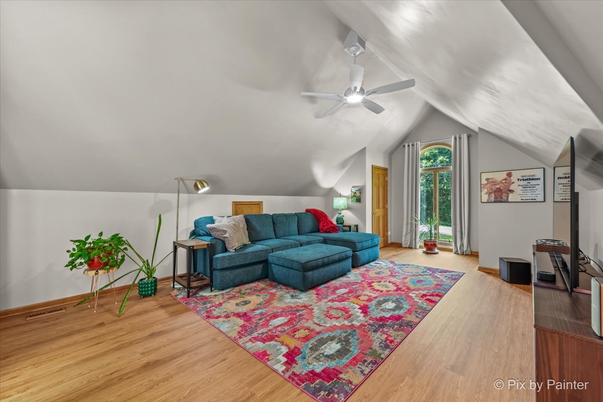 28971 Fox Street Cary, IL 60013 - Photo 28 of 51 a living room with furniture and a flat screen tv