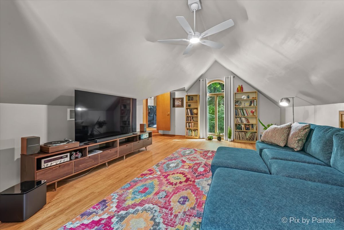 28971 Fox Street Cary, IL 60013 - Photo 29 of 51 a living room with furniture and a flat screen tv