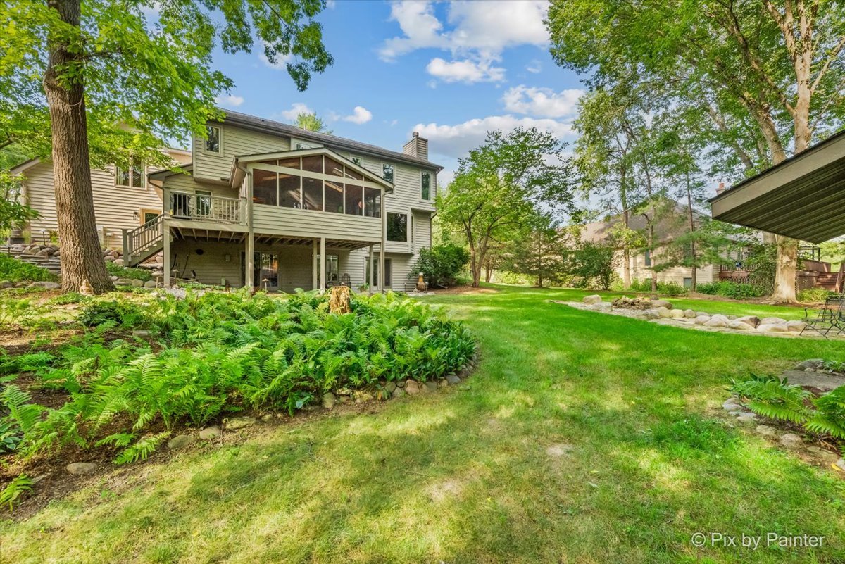 28971 Fox Street Cary, IL 60013 - Photo 37 of 51 a view of a house with a big yard plants and large trees