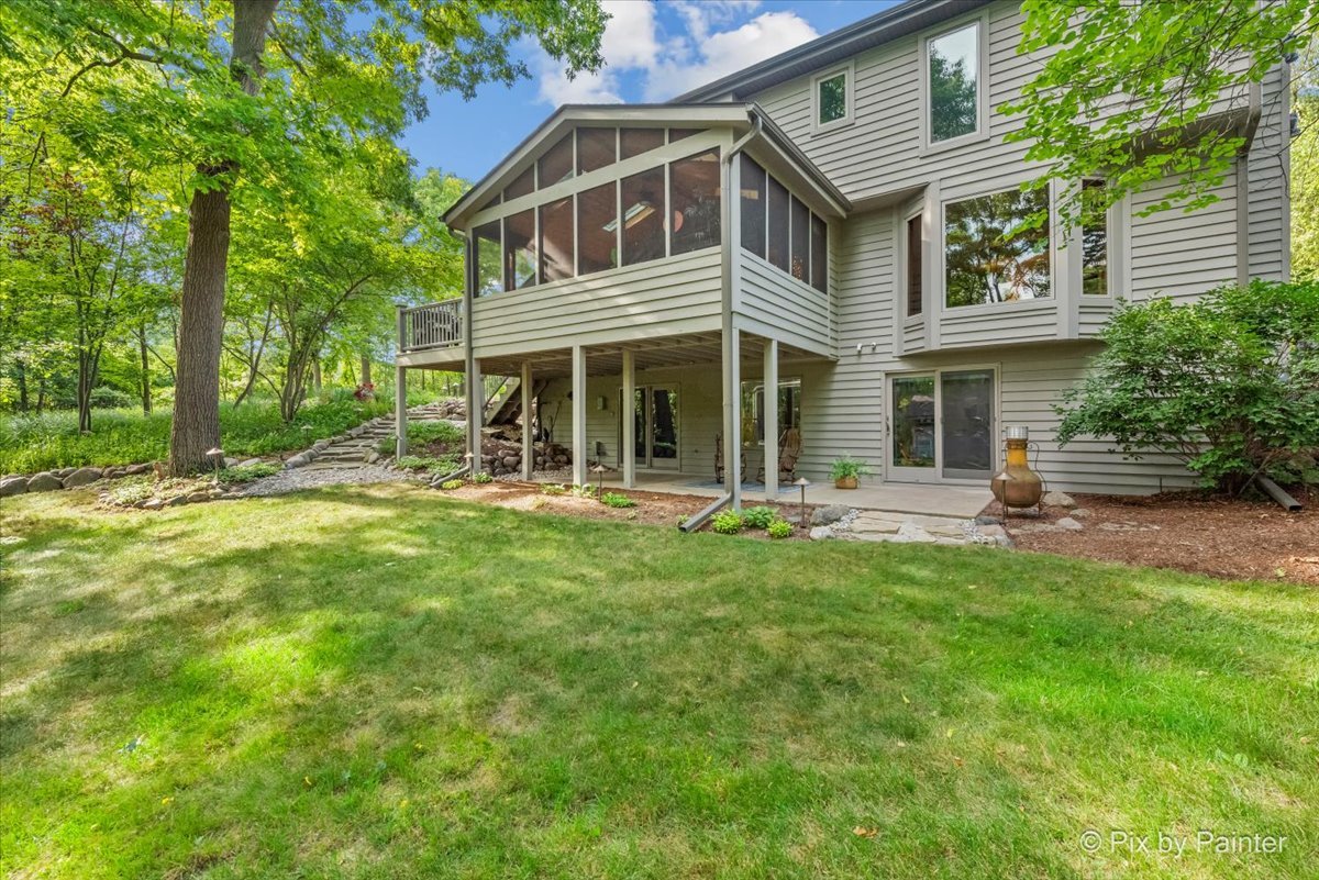 28971 Fox Street Cary, IL 60013 - Photo 40 of 51 a backyard of a house with yard and outdoor seating