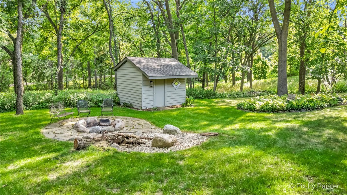 28971 Fox Street Cary, IL 60013 - Photo 43 of 51 a backyard of a house with table and chairs
