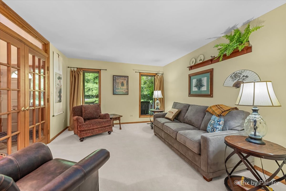 28971 Fox Street Cary, IL 60013 - Photo 7 of 51 a living room with furniture and a window