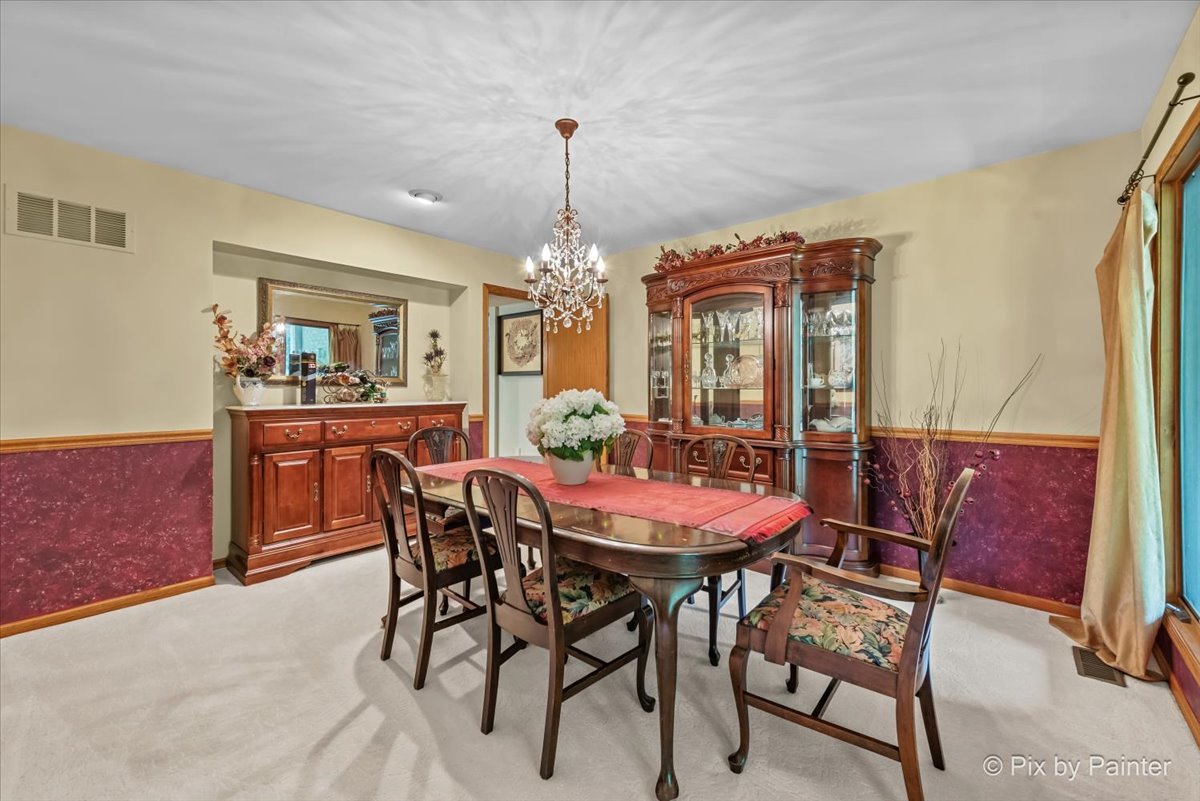 28971 Fox Street Cary, IL 60013 - Photo 8 of 51 a view of a dining room with furniture and window