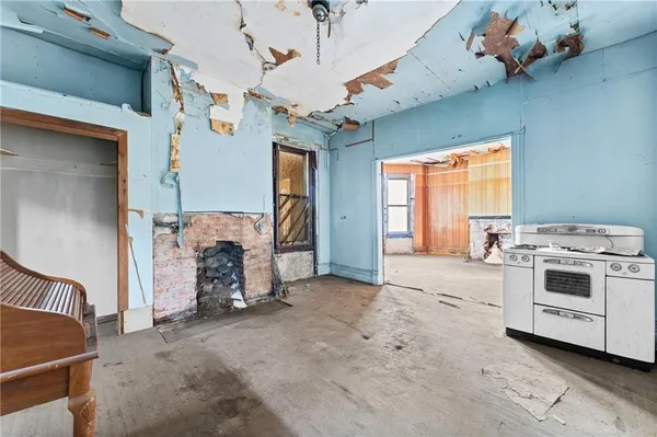 a view of balcony with wooden floor and windows