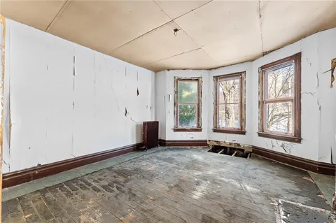 an empty room with windows