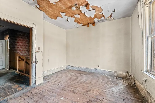 an empty room with windows