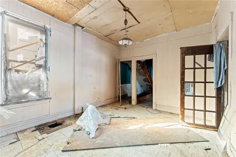 a view of a room with large windows