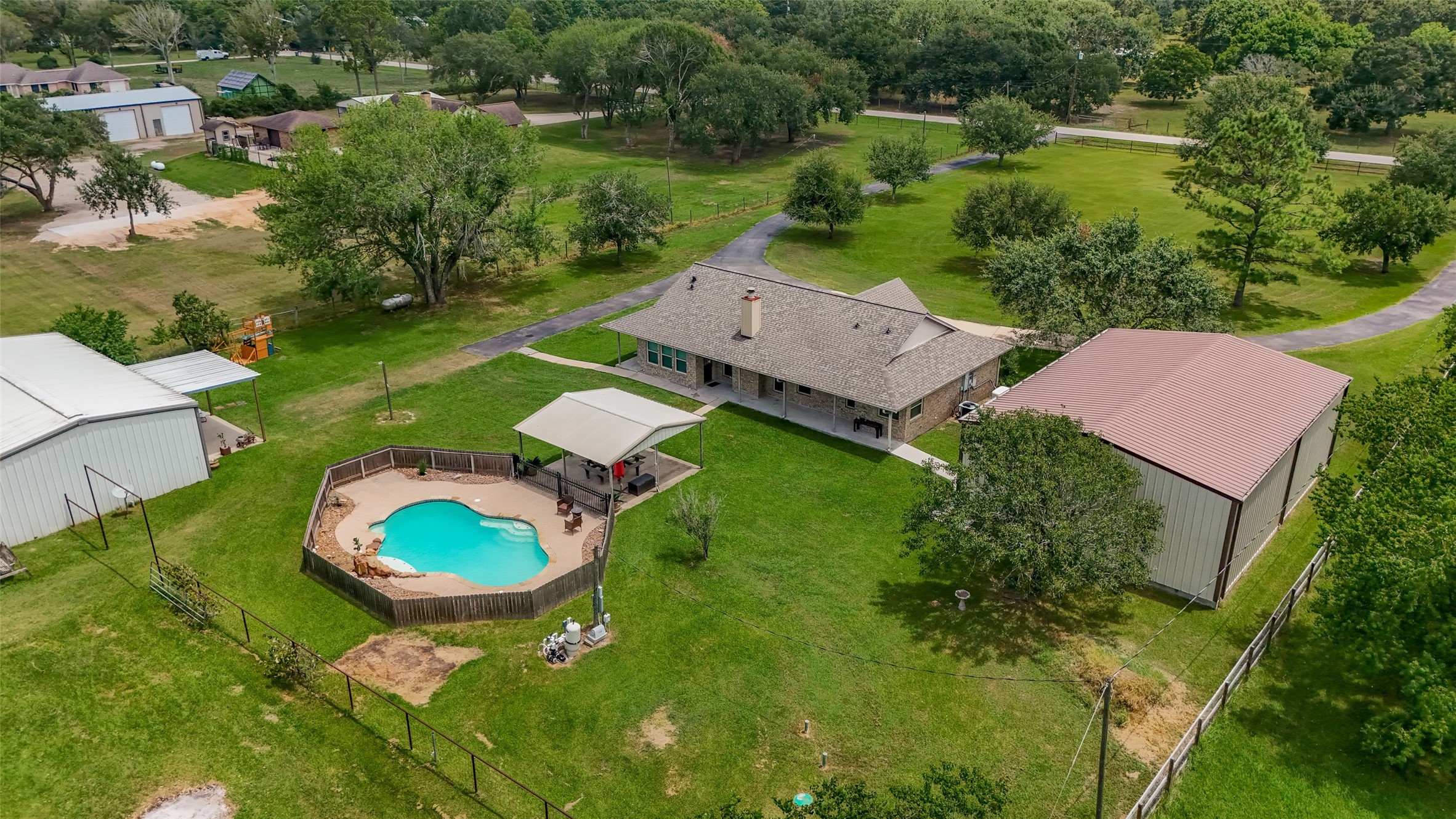1030 Ginger Street Santa Fe, TX 77517 - Photo 43 of 50 an aerial view of a house with yard swimming pool and outdoor seating