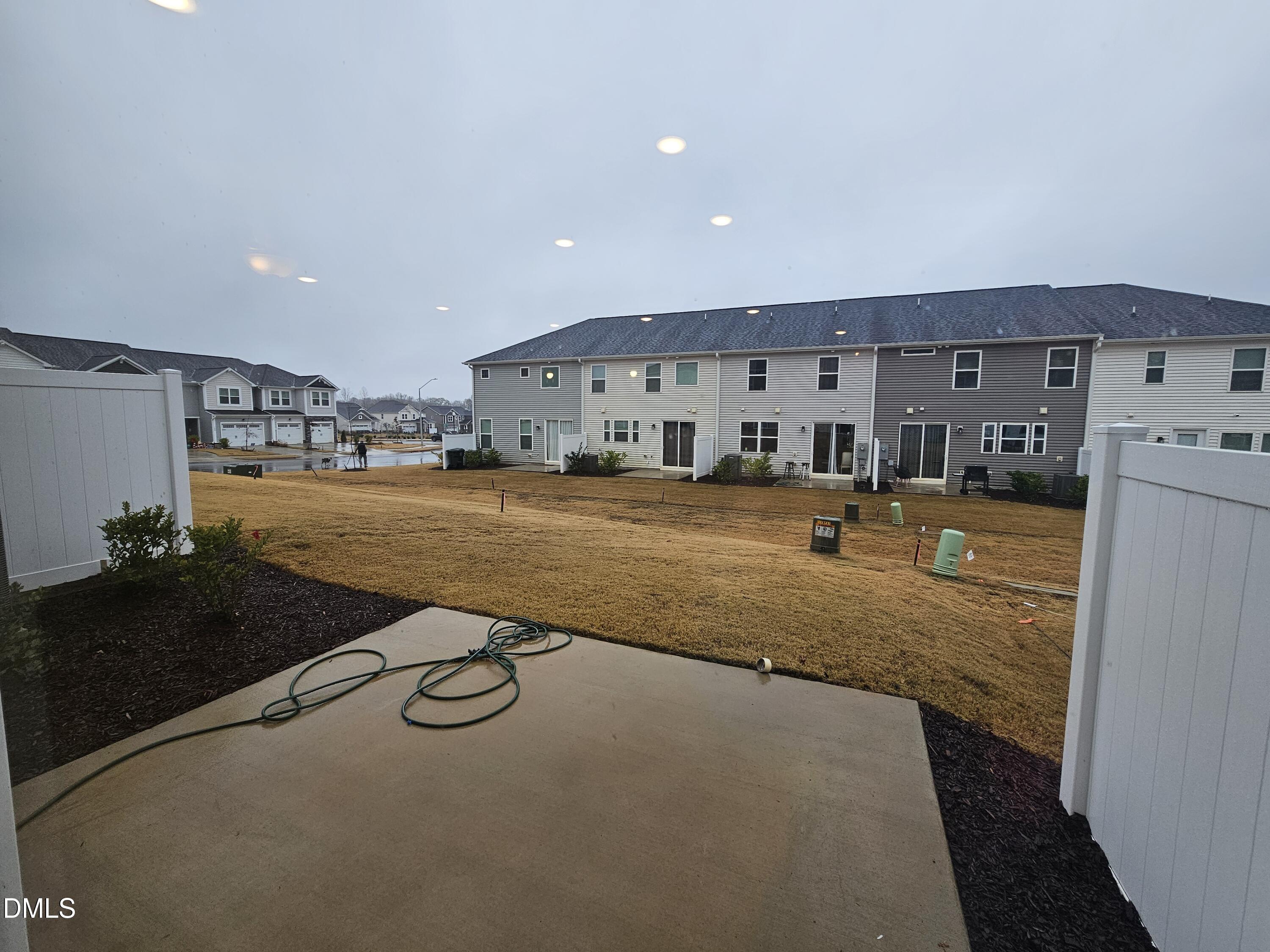111 Siebold Street Garner, NC 27529 - Photo 12 of 25 a view of a living room and kitchen