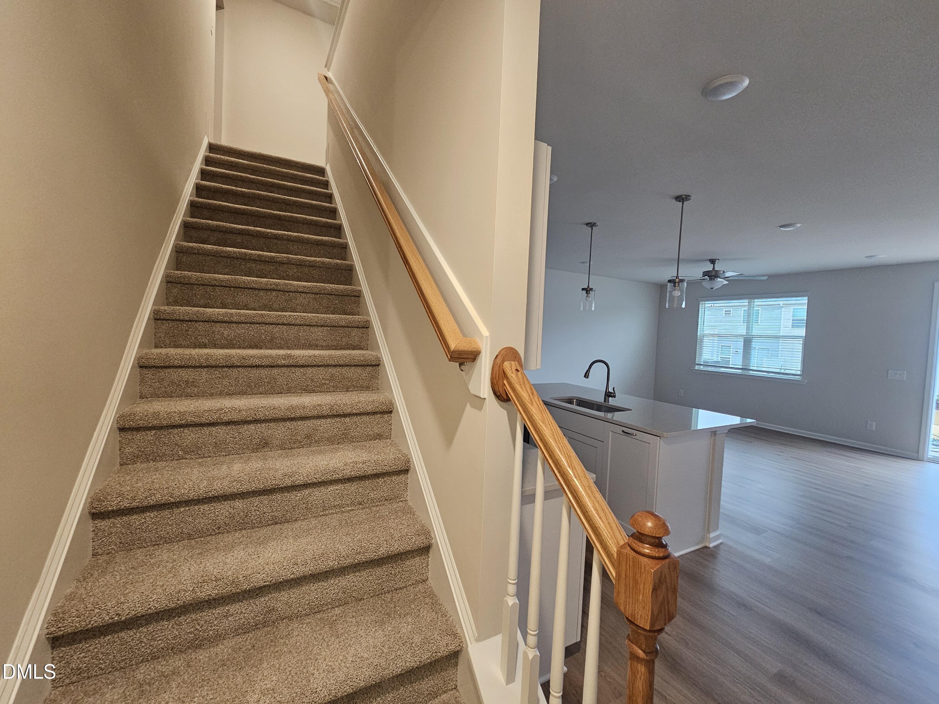 111 Siebold Street Garner, NC 27529 - Photo 13 of 25 a view of entryway and hall with wooden floor