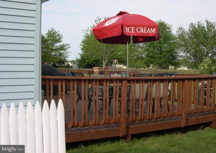 2425 Millington Road Millington, MD 21651 - Photo 5 of 10 Stained, slightly raised rear deck