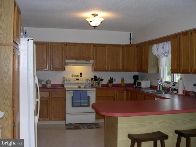 2425 Millington Road Millington, MD 21651 - Photo 7 of 10 Spacious Kitchen with Breakfast Bar