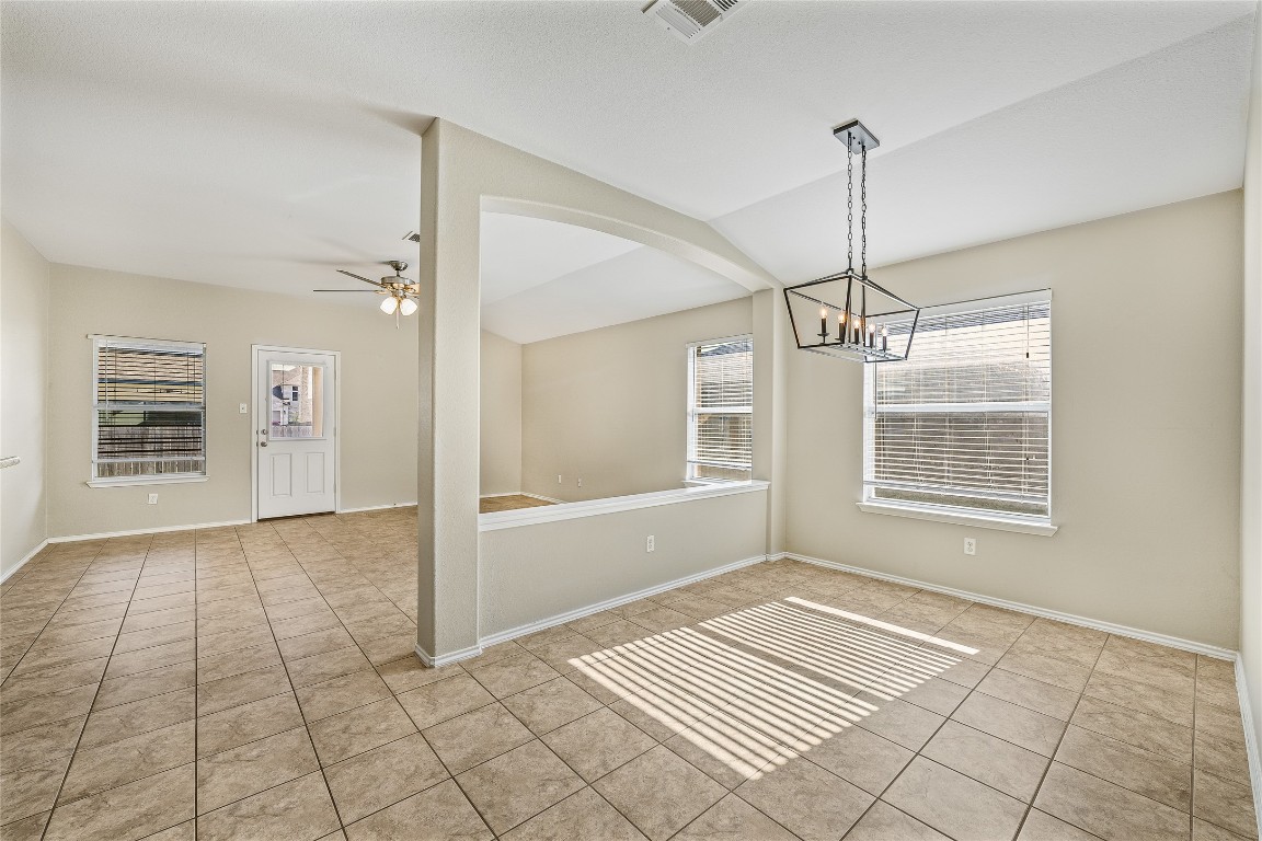 20009 Hawk Hood Drive Pflugerville, TX 78660 - Photo 4 of 16 a view of an empty room with a window