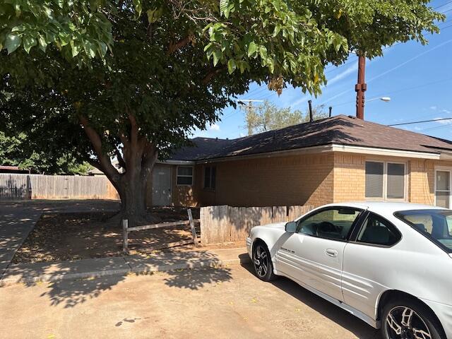 8202 Vernon Avenue, Unit A Lubbock, TX 79423 - Photo 1 of 1 a view of a car parked in front of a house