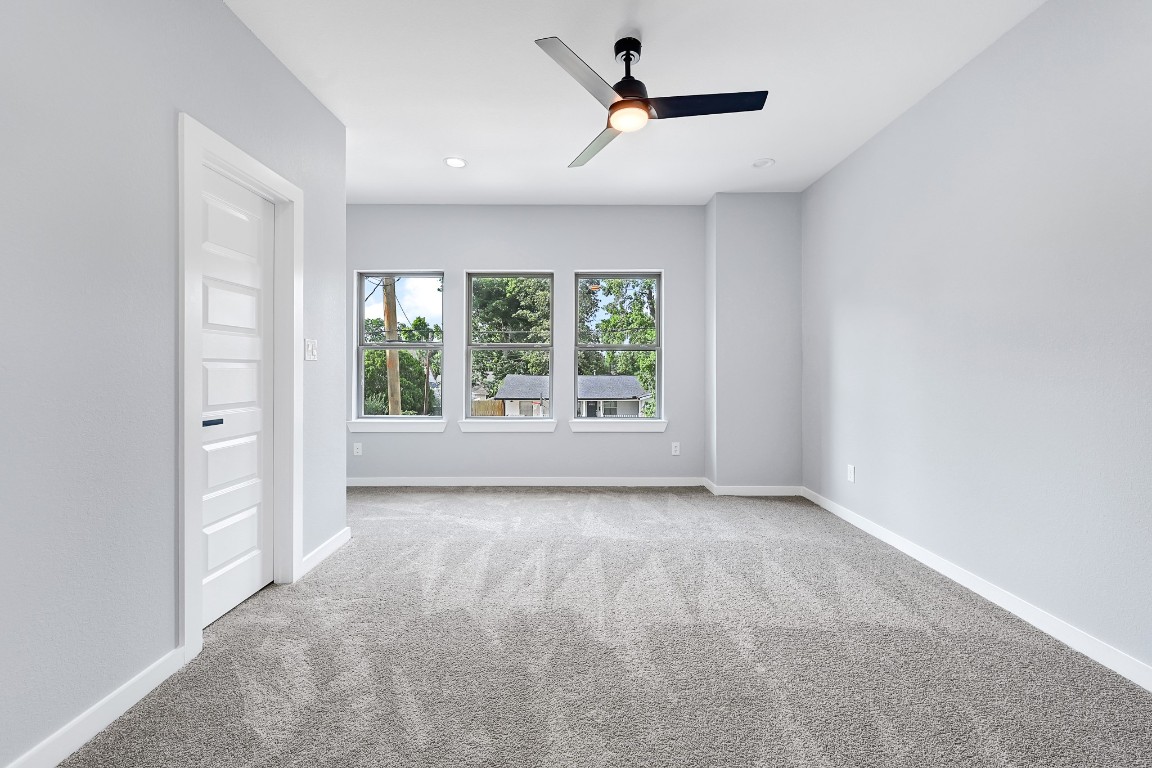 90 Burress Street, Unit B Houston, TX 77022 - Photo 27 of 31 a view of room with a ceiling fan and window