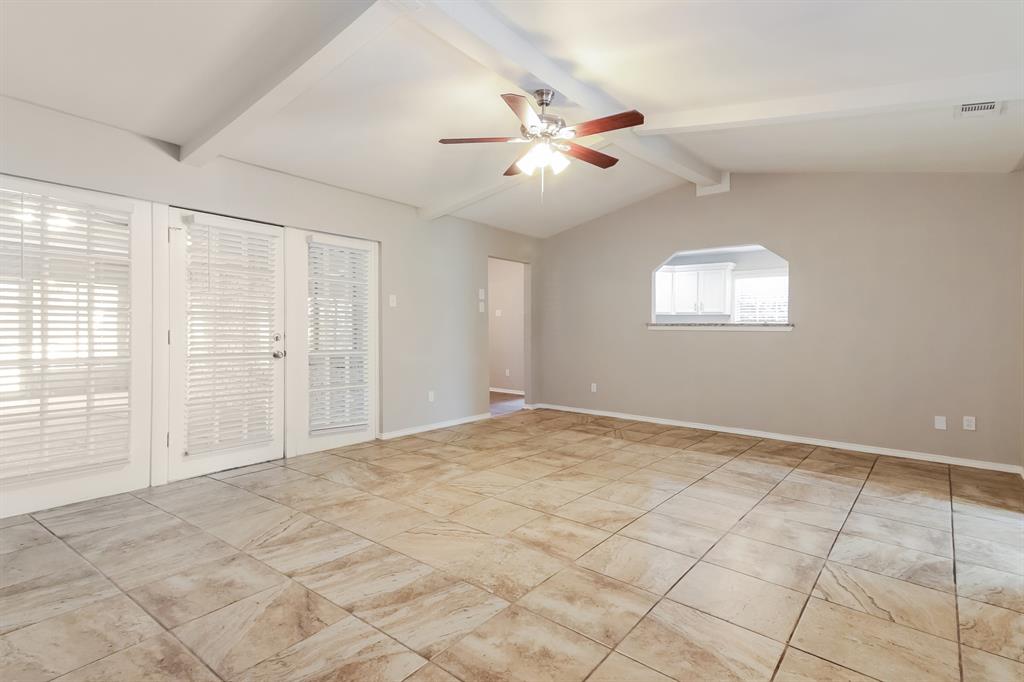 4821 Ashbrook Road Dallas, TX 75227 - Photo 12 of 21 a view of an empty room with a window