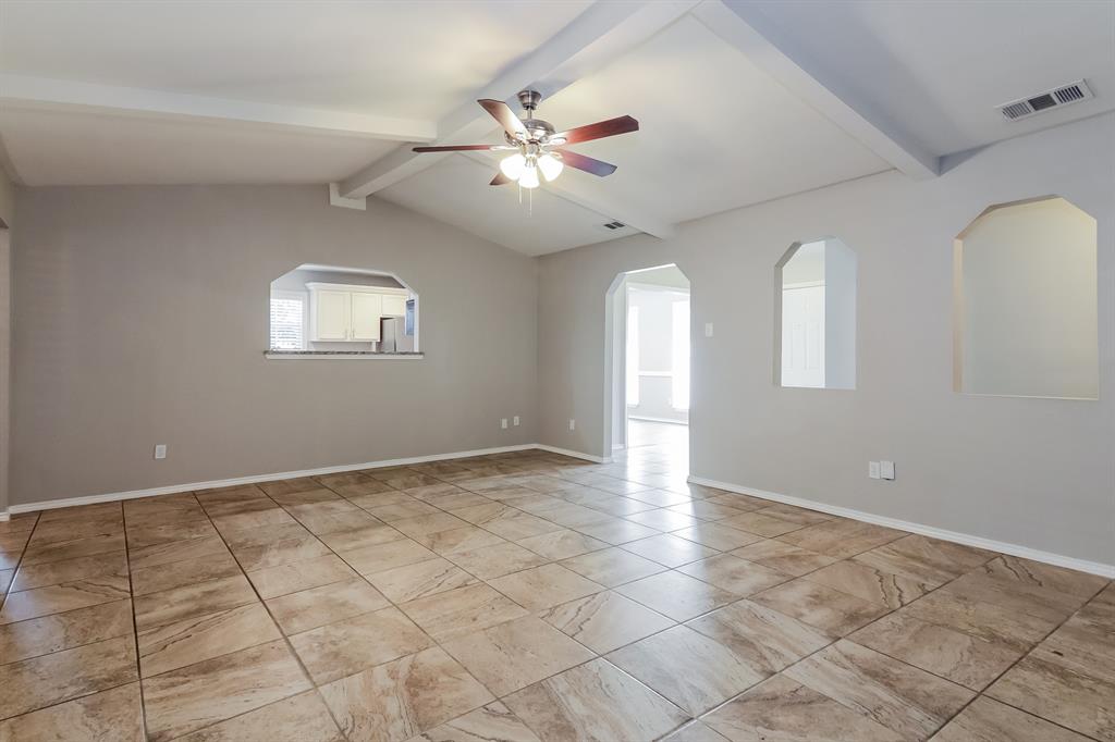 4821 Ashbrook Road Dallas, TX 75227 - Photo 5 of 21 a view of an empty room with a window