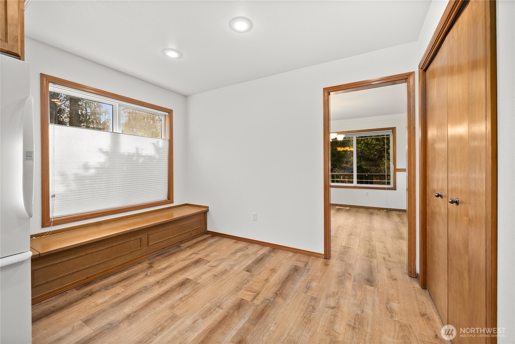 7626 78th Loop Northwest Olympia, WA 98502 - Photo 11 of 38 a view of empty room with wooden floor and fan