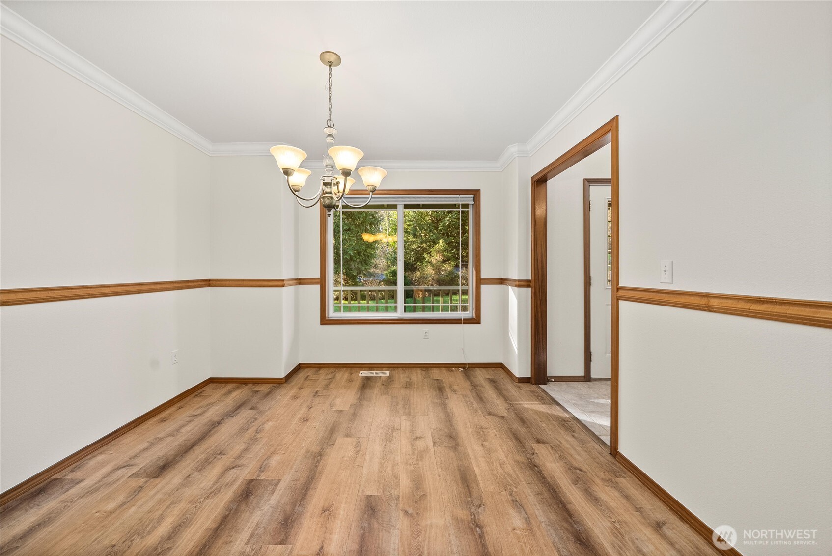 7626 78th Loop Northwest Olympia, WA 98502 - Photo 13 of 38 a view of a room with wooden floor fan and window