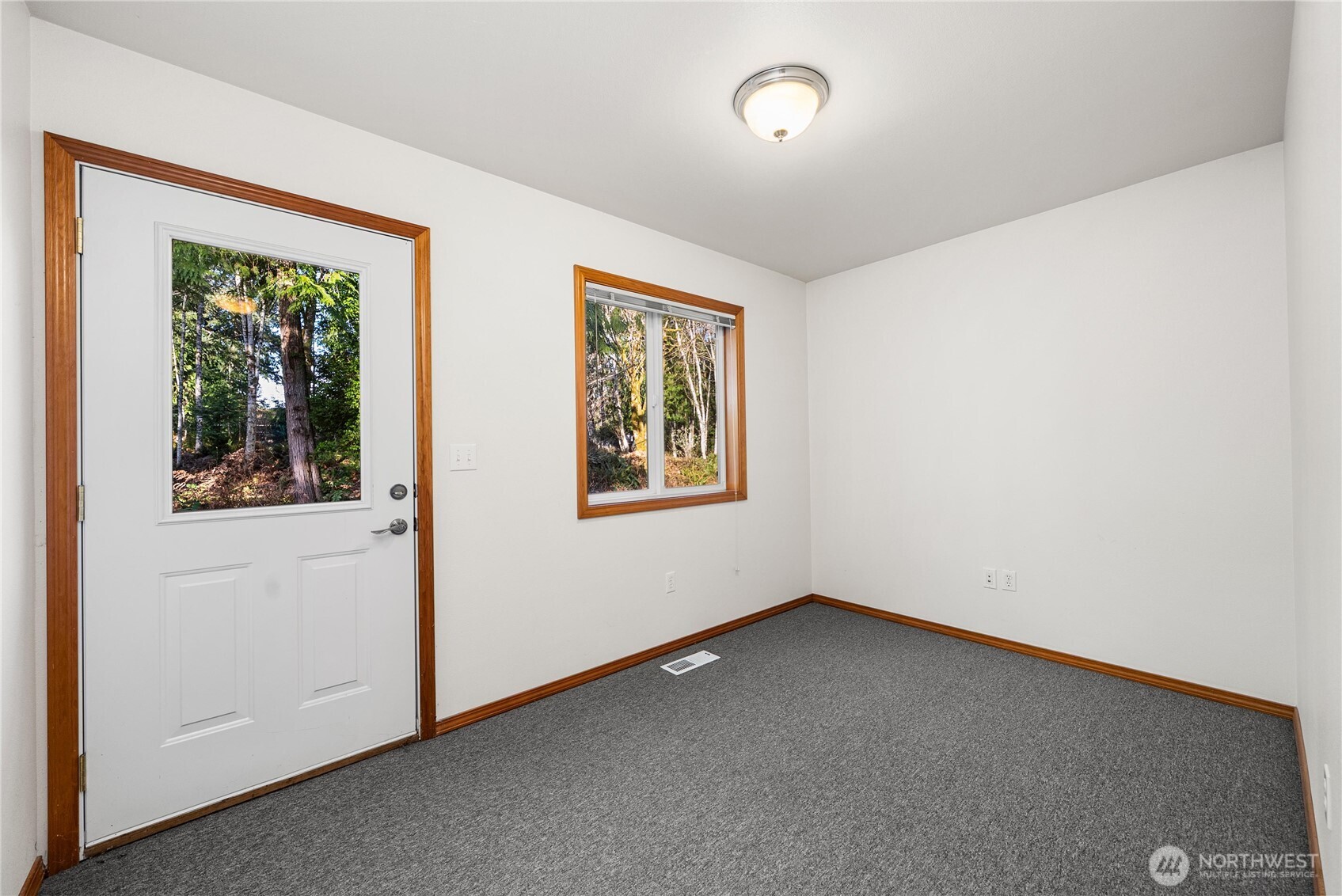 7626 78th Loop Northwest Olympia, WA 98502 - Photo 15 of 38 an empty room with a window