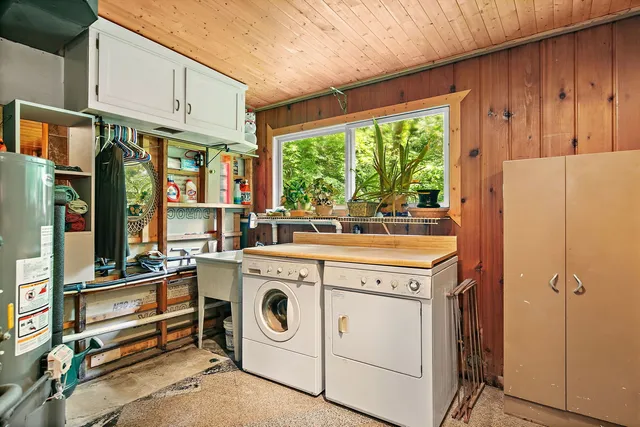 a view of a kitchen with washer and dryer
