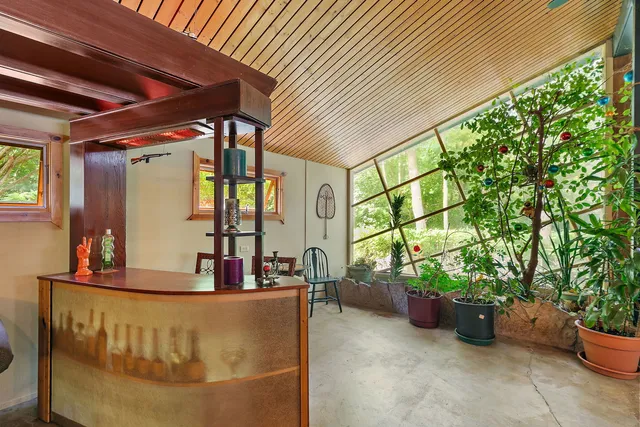 a view of swimming pool with a patio