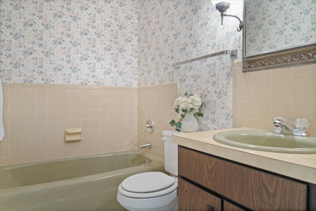 213 Concord Drive Normal, IL 61761 - Photo 15 of 21 a bathroom with a sink a toilet and shower