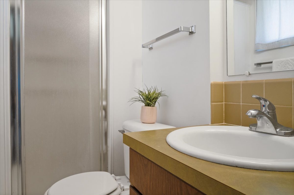 213 Concord Drive Normal, IL 61761 - Photo 17 of 21 a bathroom with a sink and toilet