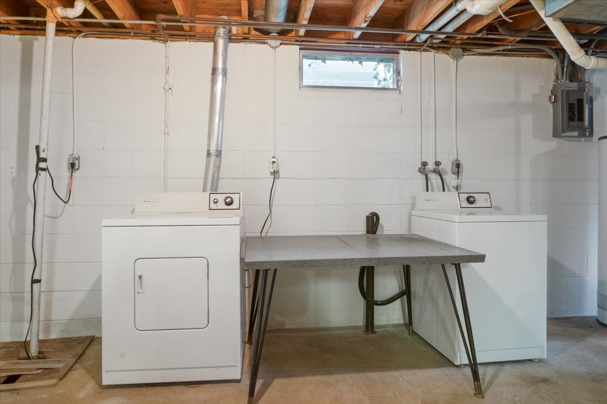 213 Concord Drive Normal, IL 61761 - Photo 20 of 21 a view of a bathroom with a sink and mirror