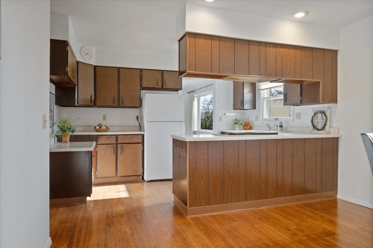 213 Concord Drive Normal, IL 61761 - Photo 9 of 21 a kitchen with refrigerator cabinets and a counter top space