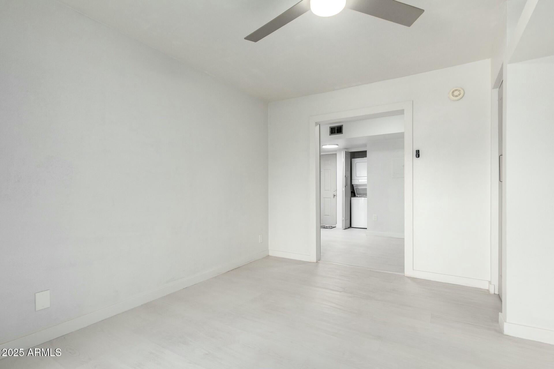 540 North May, Unit 1075 Mesa, AZ 85201 - Photo 21 of 23 a view of an empty room and window