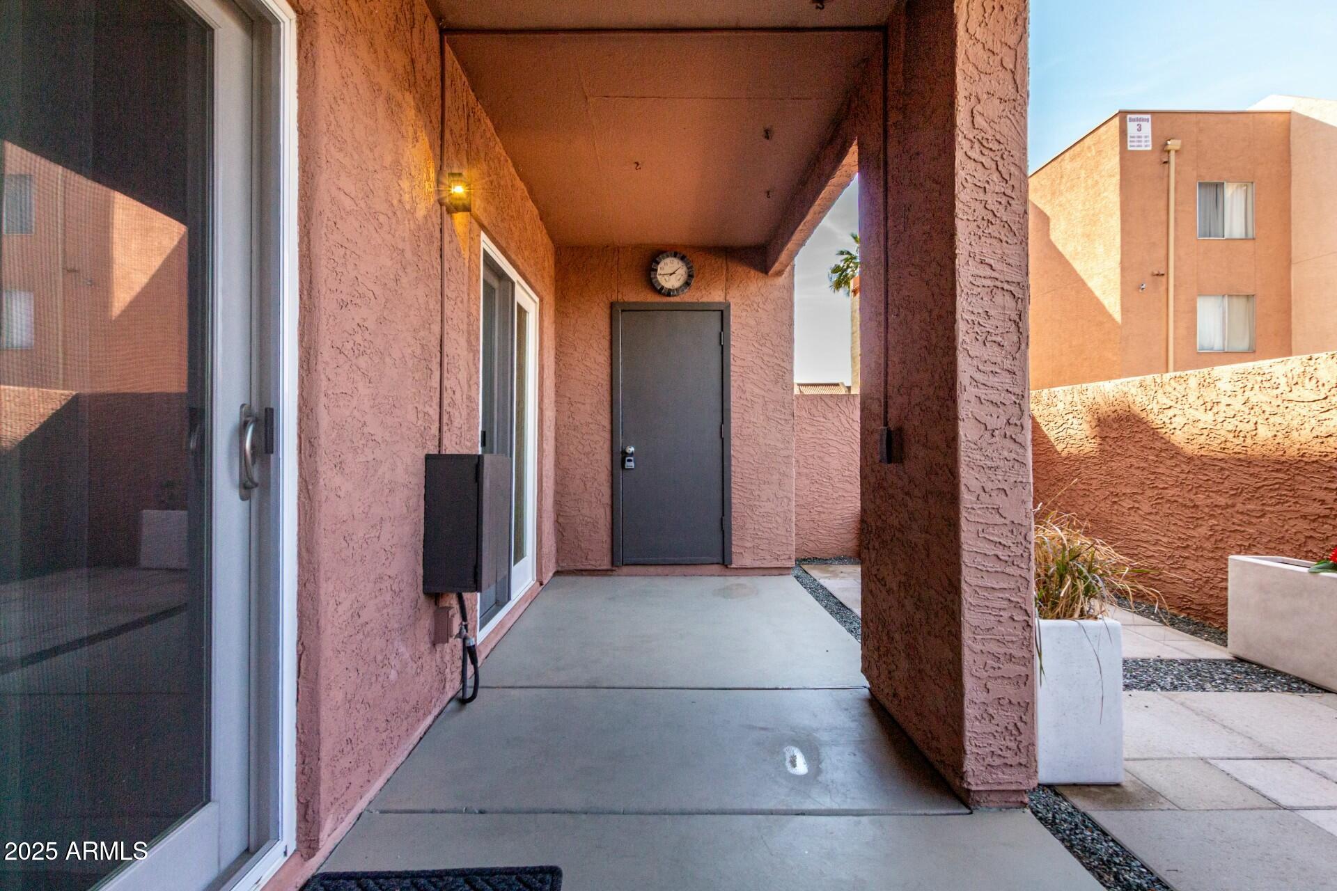 540 North May, Unit 1075 Mesa, AZ 85201 - Photo 4 of 23 a view of a hallway with windows
