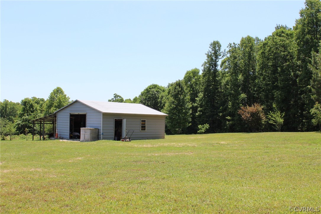 820 Modest Creek Road Victoria, VA 23974 - Photo 8 of 22 a white house with a large pool