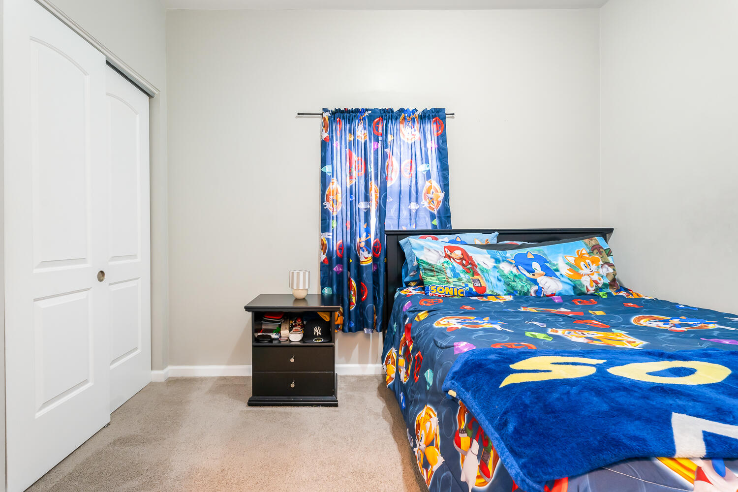 1111 Truman Street Hammond, IN 46320 - Photo 11 of 24 a bedroom with a bed and a small place in it