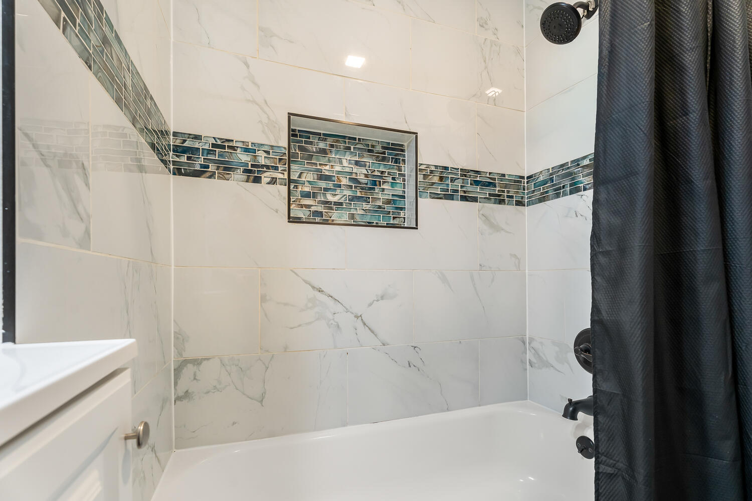 1111 Truman Street Hammond, IN 46320 - Photo 14 of 24 a bathroom with a bathtub and shower