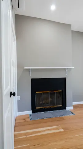 a view of a livingroom with a fireplace