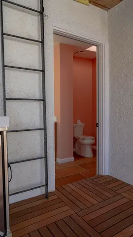 a view of walk in closet with window