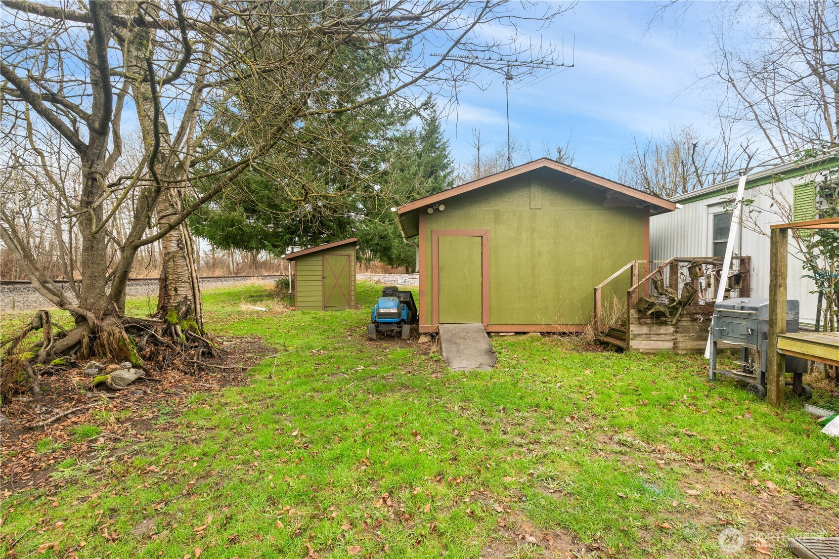 3090 Cole Road Everson, WA 98247 - Photo 12 of 22 a view of a backyard with a small cabin