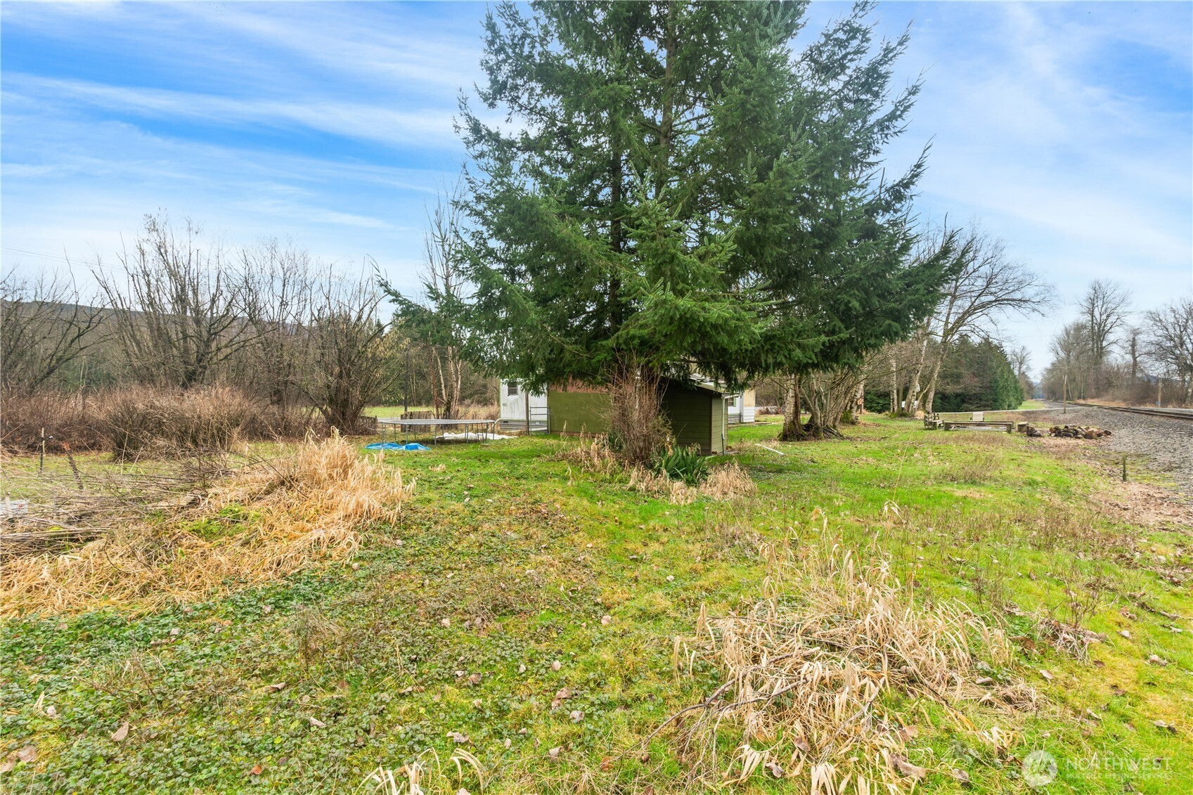 3090 Cole Road Everson, WA 98247 - Photo 18 of 22 a view of a fountain in front of the house