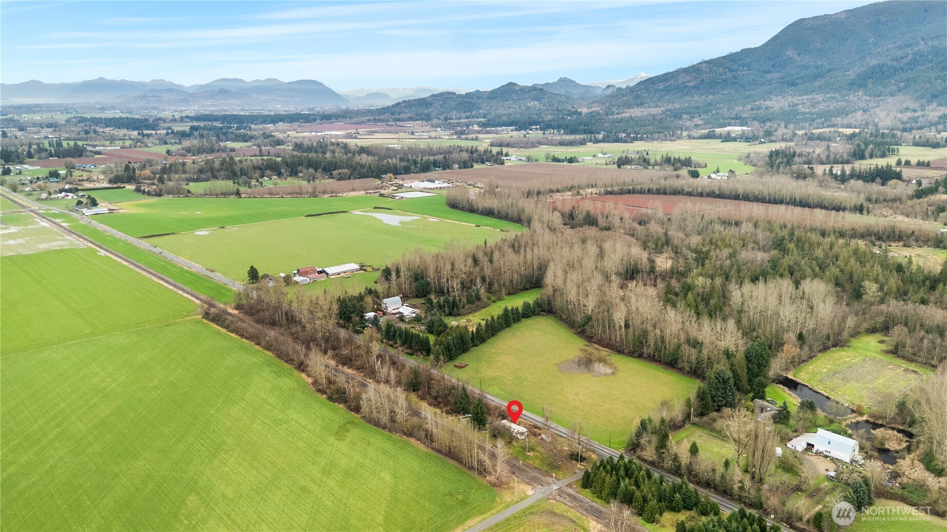 3090 Cole Road Everson, WA 98247 - Photo 21 of 22 a view of a city with mountains houses and a mountain view