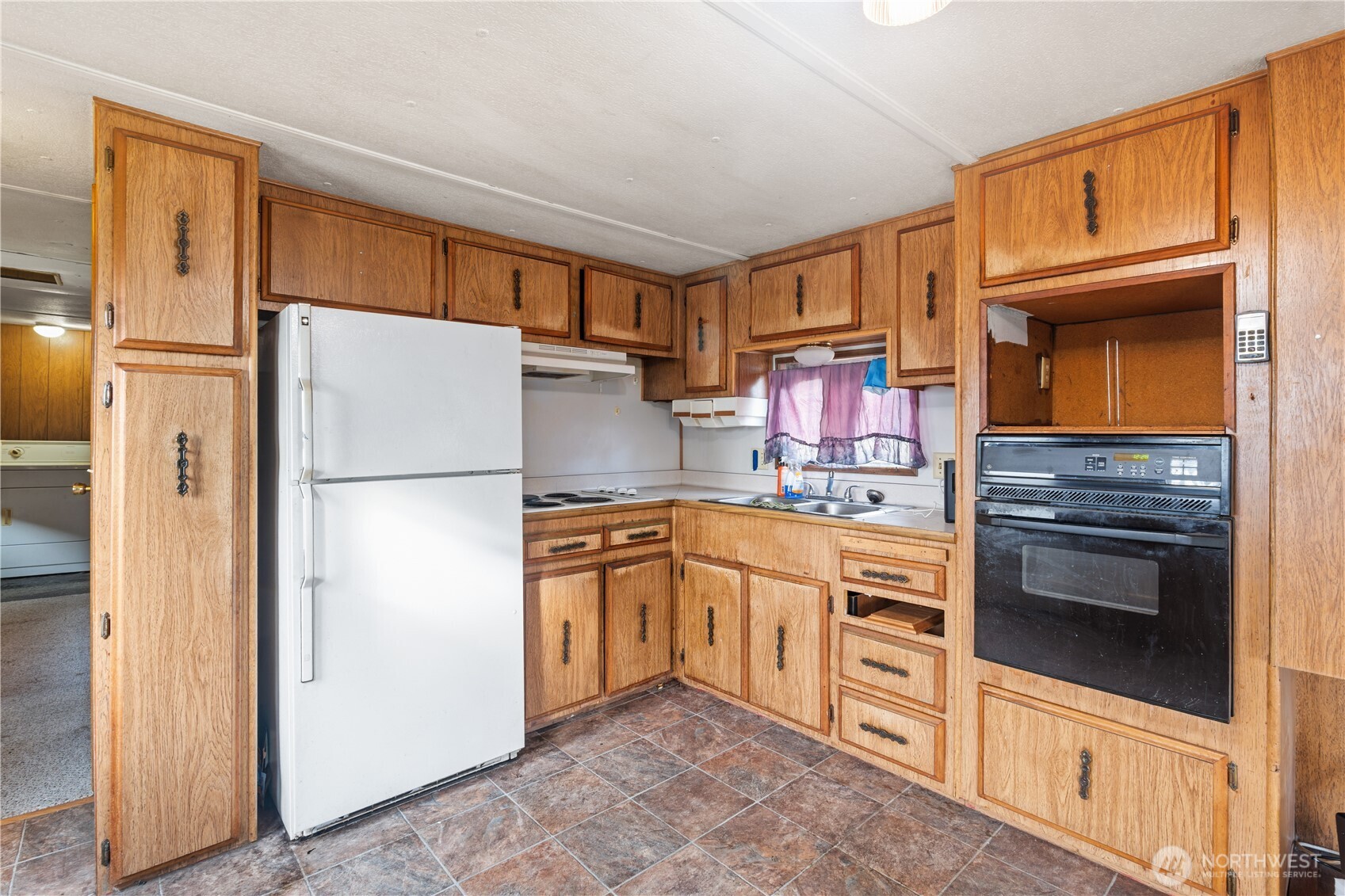 3090 Cole Road Everson, WA 98247 - Photo 3 of 22 a kitchen with stainless steel appliances granite countertop a refrigerator and a stove top oven