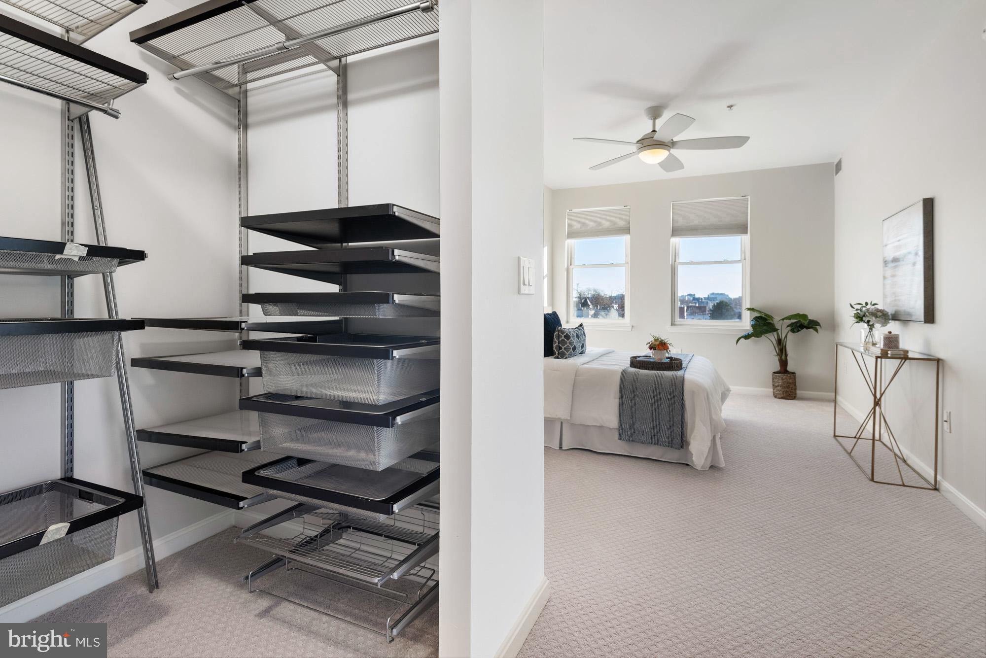 2001 12th Street Northwest, Unit 306 Washington, DC 20009 - Photo 18 of 36 a view of a livingroom with furniture and a ceiling fan