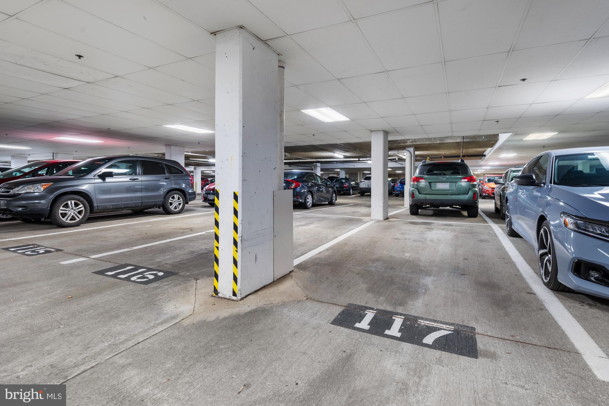 2001 12th Street Northwest, Unit 306 Washington, DC 20009 - Photo 24 of 36 a view of parking garage with cars and other equipment