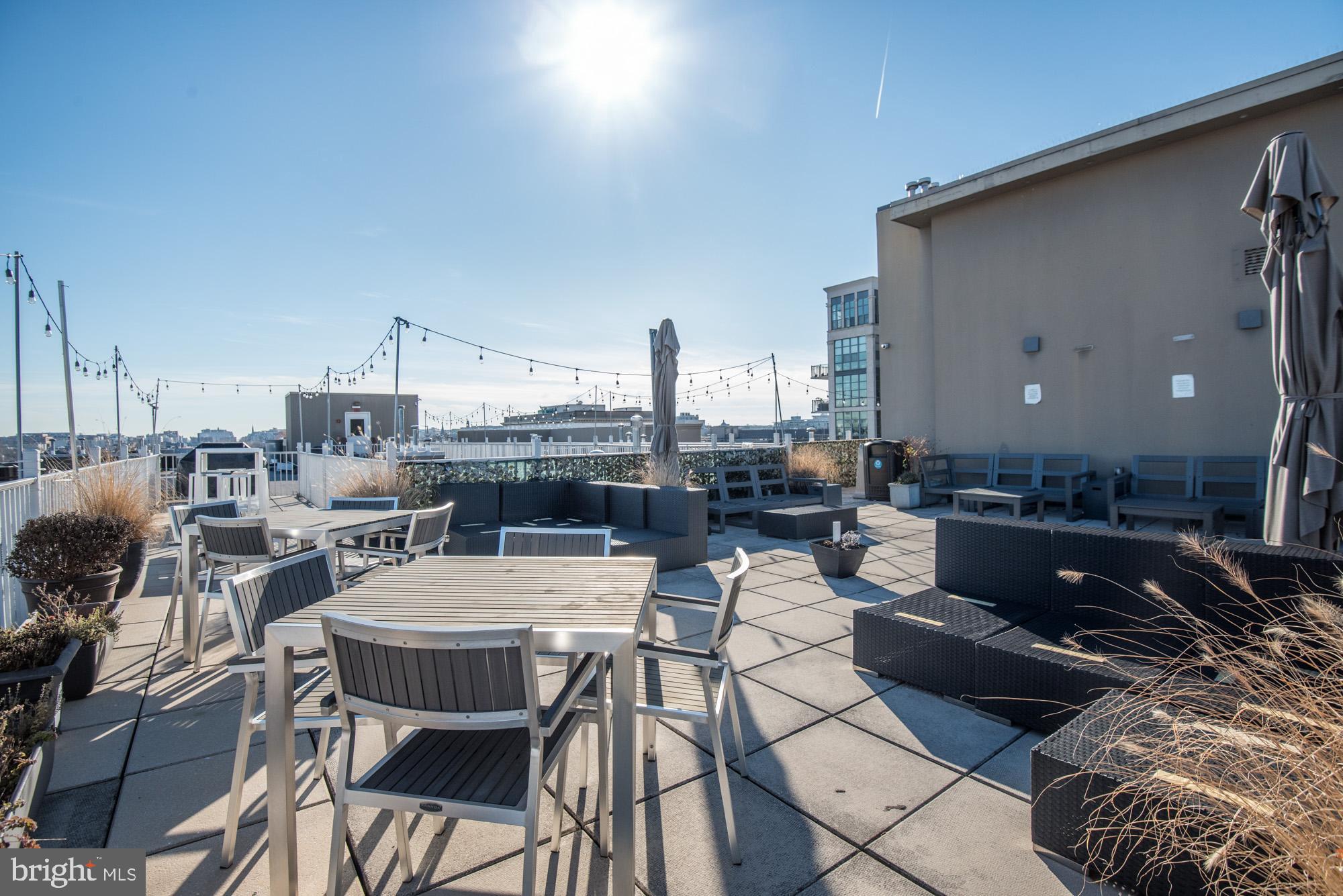 2001 12th Street Northwest, Unit 306 Washington, DC 20009 - Photo 27 of 36 a view of a dining room with furniture