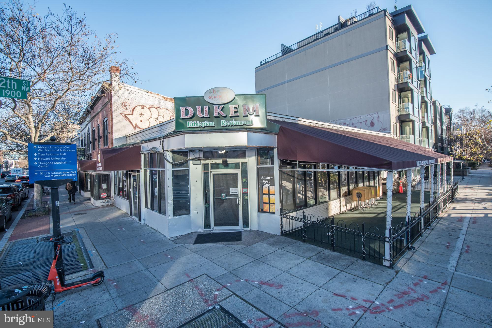 2001 12th Street Northwest, Unit 306 Washington, DC 20009 - Photo 31 of 36 a view of a cafe with sitting area