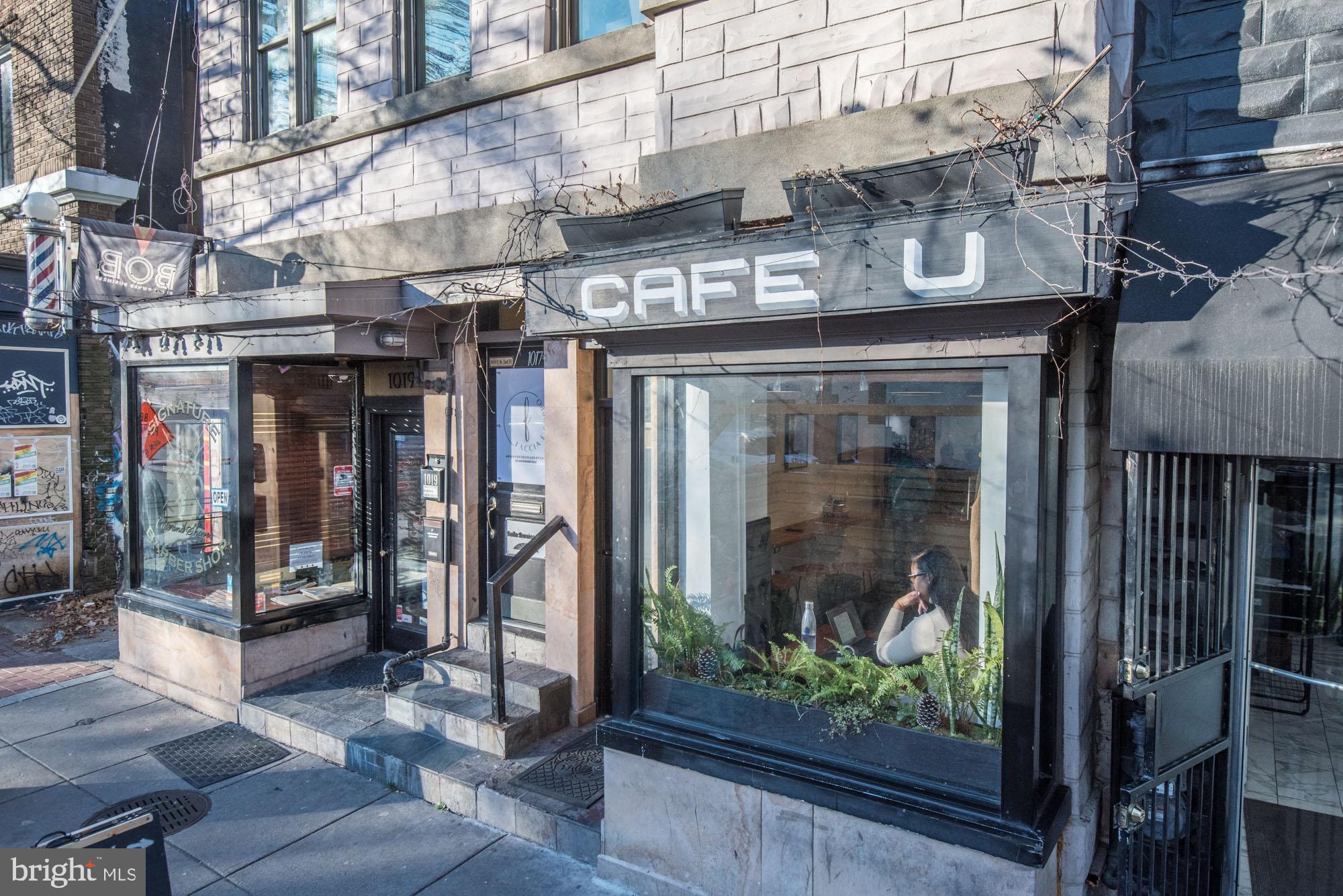 2001 12th Street Northwest, Unit 306 Washington, DC 20009 - Photo 34 of 36 a view of shops on a street