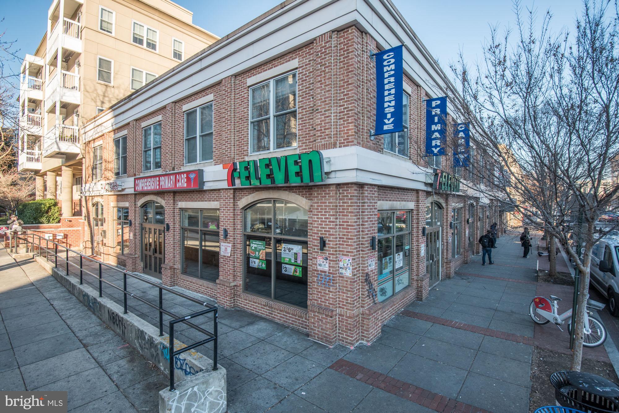 2001 12th Street Northwest, Unit 306 Washington, DC 20009 - Photo 35 of 36 a front view of a building with glass windows